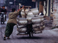 Man Transporting Locally Made Ceramic Pots by Bicycle, Hanoi, Vietnam