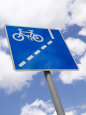 Blue Bicycle Crossing Street Sign