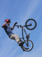 Man Performing Trick on a Bicycle