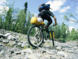 Bikers Travel Across the Rough Terrain and Melt Ice of Southern Alaska