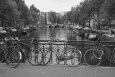 Bicycle Leaning Against a Metal Railing on a Bridge, Amsterdam, Netherlands