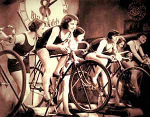 Women On Indoor Bicycle Roller Trainers
